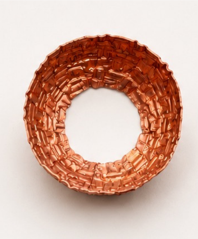 Circular woven copper basket texture